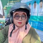 Emi, warga Jombang yang menjadi ojek muslimah selama Muktamar ke-35 NU untuk melayani kebutuhan mobilitas nahdliyin perempuan./dok.via PBNU