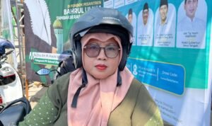 Emi, warga Jombang yang menjadi ojek muslimah selama Muktamar ke-35 NU untuk melayani kebutuhan mobilitas nahdliyin perempuan./dok.via PBNU