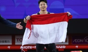 Rahmat Erwin Abdullah Emas Asian Games 2026 Atlet angkat besi Rahmat Erwin Abdullah mempersembahkan medali emas kedua untuk Indonesia di Asian Games 2026 (26/9)./dok.Kemenpora RI